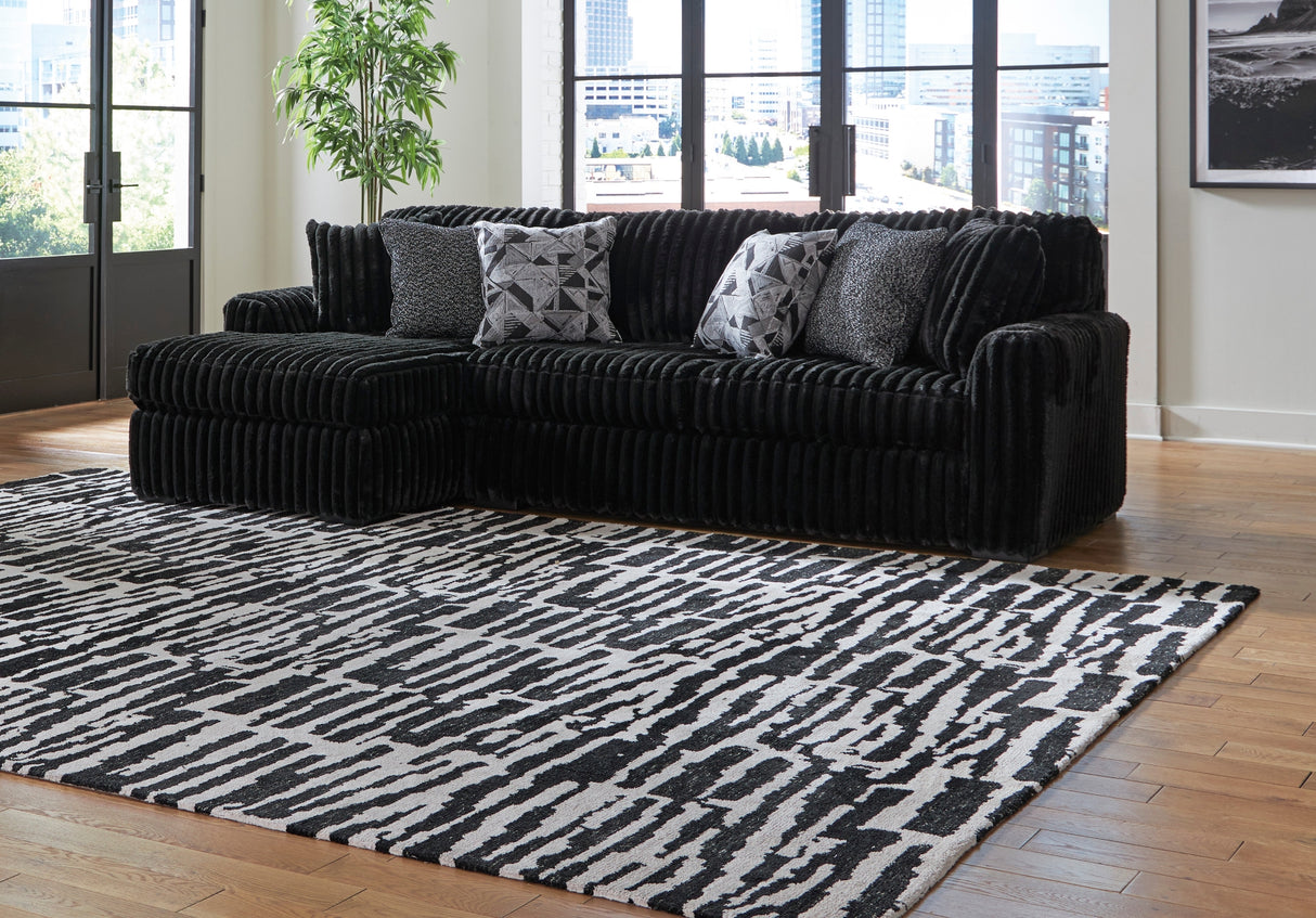 Sofa noir velours côtelé chaise longue à gauche - Gabbyleigh